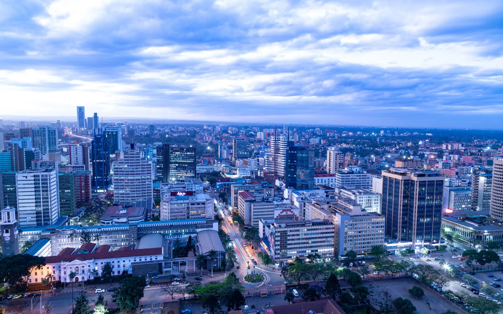 Nairobi skyline beneath an evening sky.